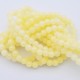 10 perles jade ronde jaune paille 6mm