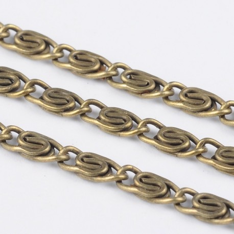 1 mètre  CHM003Ychaine fantaisie torsadée bonze 2,5x6,5mm