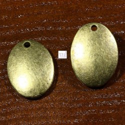 10 breloques sequins ovale bombé  bronze  relief 16x12mm