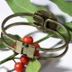1 support bracelet double jonc rigide  bronze  +cabochon verre 25mm