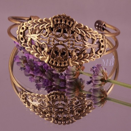 1 bracelet double jonc estampe filigranée ciselé et ajourée réglable