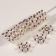 20 perles intercalaire  flocon  de  neige  en laiton  argenté vif  diametre 7mm