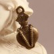6 breloques flacon parfum bronze relief 18x8mm