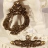 1 fermoir  toggles métal couleur bronze  ciselés fleurs 38x29mm