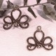 10 connecteurs métal couleur bronze  motif volutes 21mm