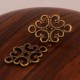 10 connecteurs métal couleur bronze arabesque ethnique 18x13mm
