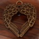 2 pendentifs double aile d'ange bronze 45x37mm