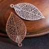 4 petites estampes feuilles nervurées laiton argentées 27x15mm