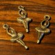6 breloques danseuse en laiton couleur bronze  19x8mm