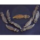 20 breloques feuilles à relief couleur bronze fines 25x6mm