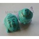 2 perles têtes  de bouddha en turquoise teintée en relief 29x20mm