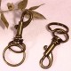 2 porte clefs mousquetons bronze +anneau double  fixation 54x16mm