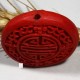 1 perle  sculptée cinabre rouge plat rond 30x10mm