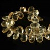 2 perles de  gemmes briolette  topaze imperiale +/- 10mm