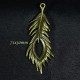 2 breloques pendentif plume bronze relief 70x30mm