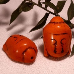 4 perles têtes  de bouddha en Howlite  teintée orange  en relief 29x20mm