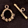 1fermoir toggle laiton bronze cascade de  fleur 17x13mm