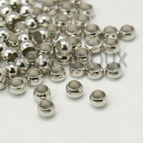 100 perles à ecraser laiton couleur argent platine  diametre interne 1mm