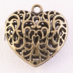 1 grand  pendentif coeur bronze  ciselé bombé 35mm